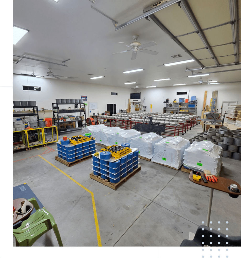 Warehouse interior with organized shelves and pallets.